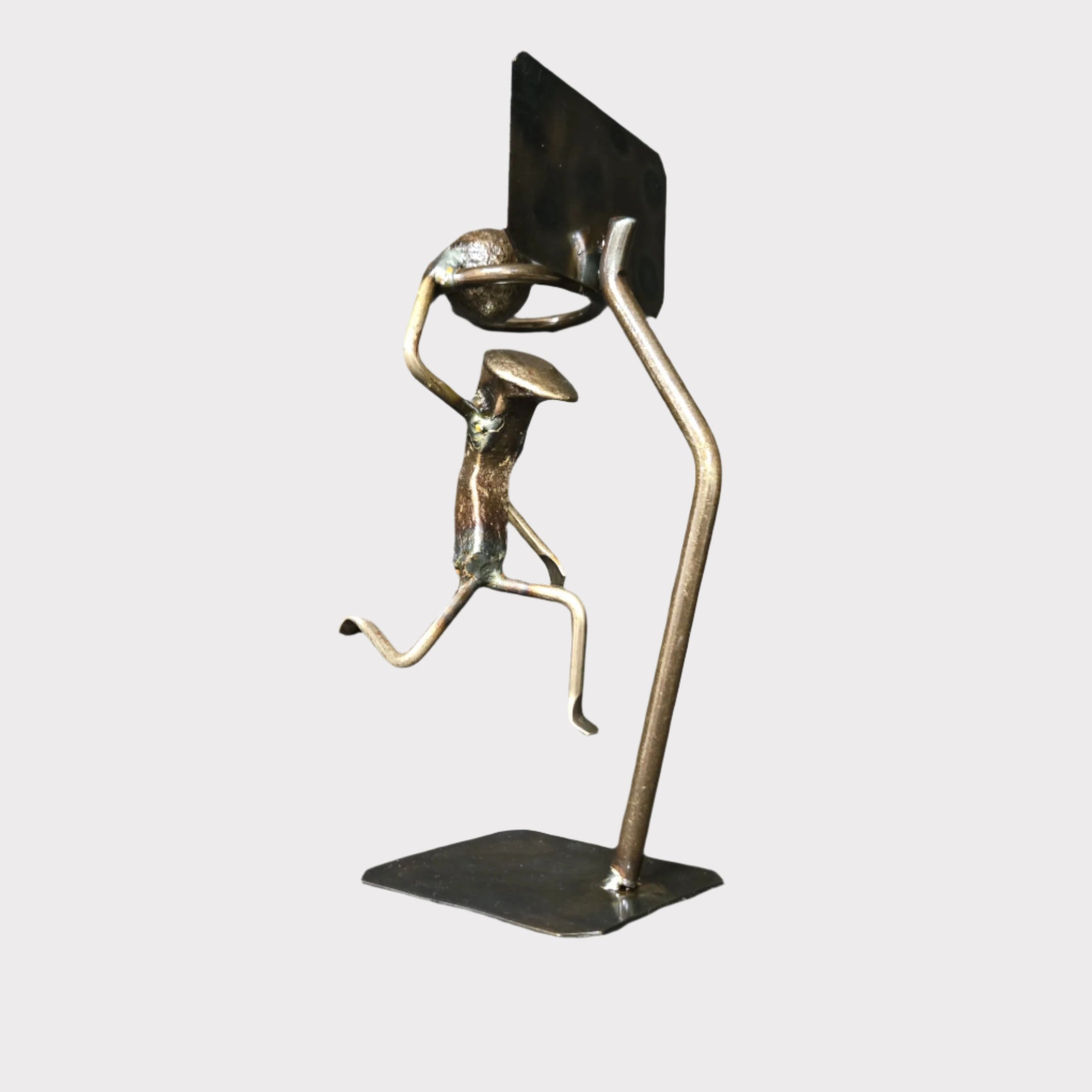 The Basketball Figure is approximately 9 inches tall. Leg/Arm positioning may vary.