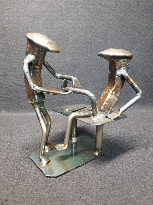 physical therapist inspecting a clients leg metal spike art product photo