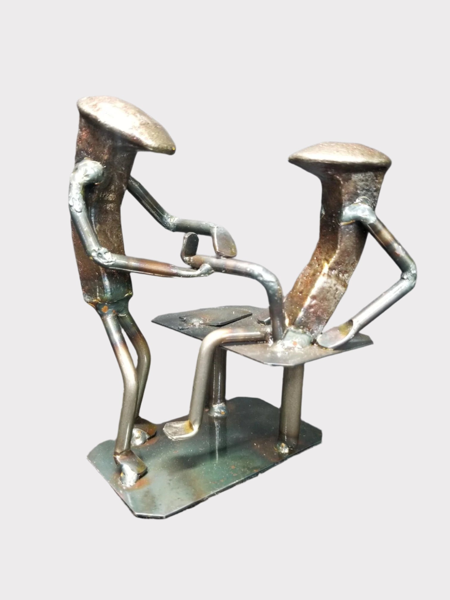 physical therapist inspecting a clients leg metal spike art product photo