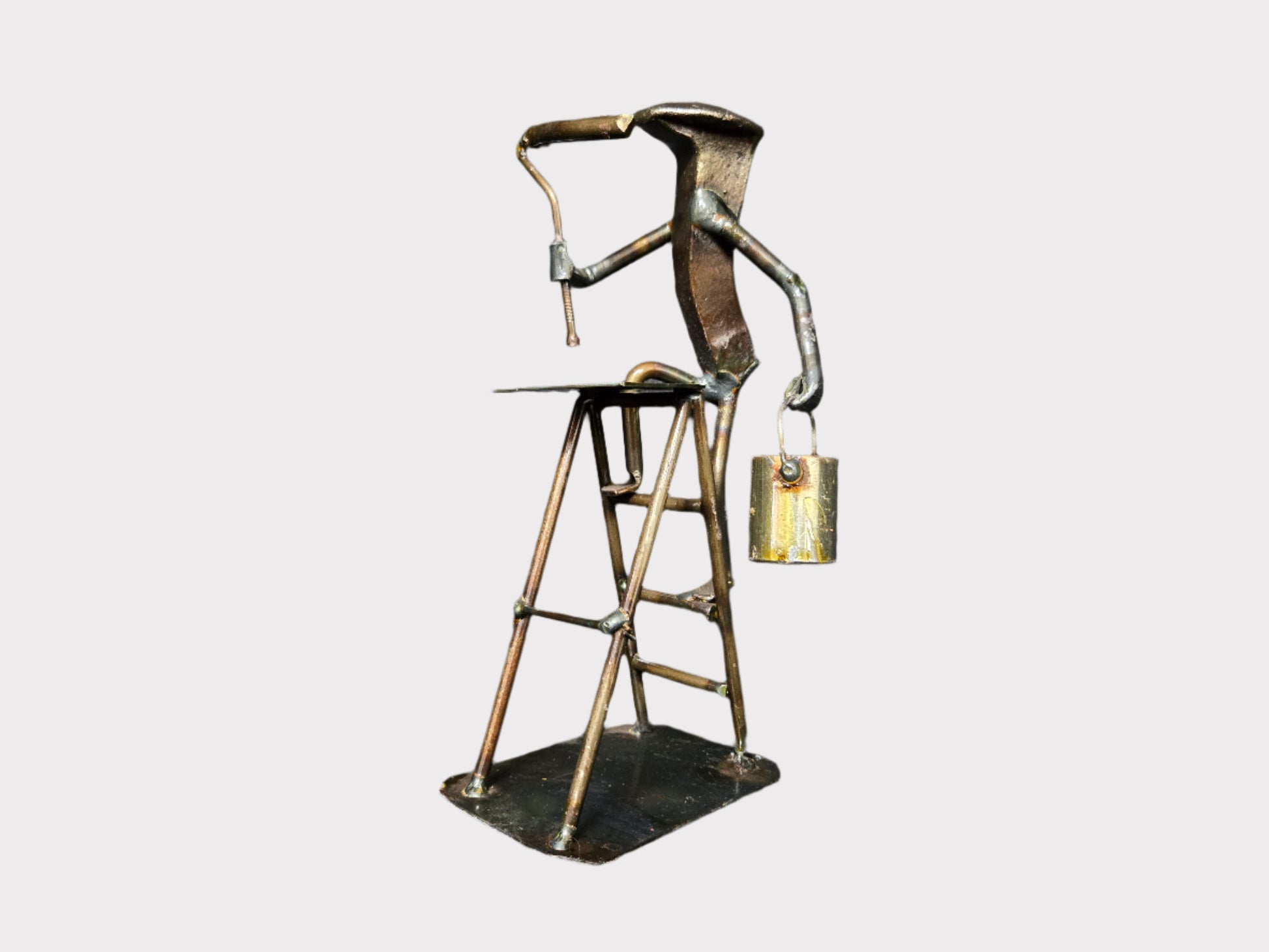The Painter on a Ladder figure stands approximately 8 inches tall.