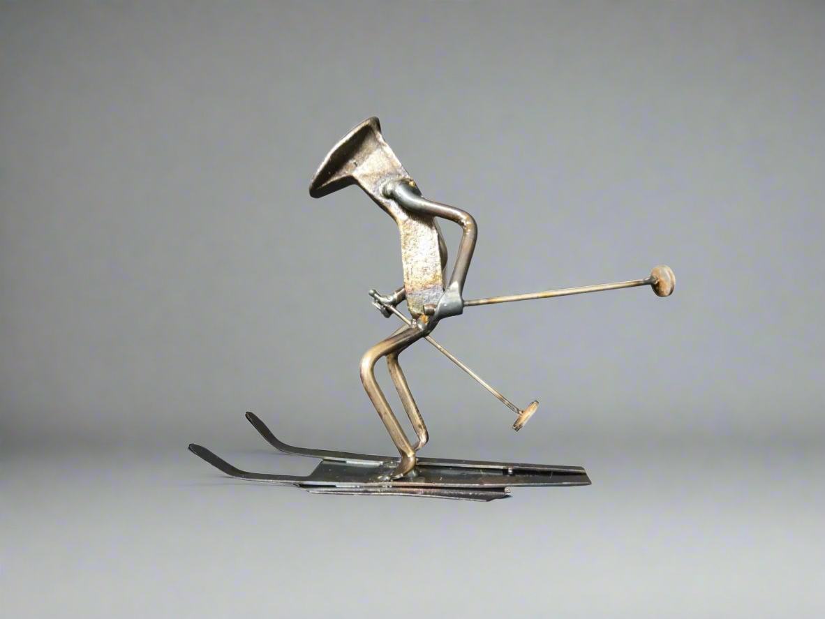 Skiers are roughly 6 inches tall.