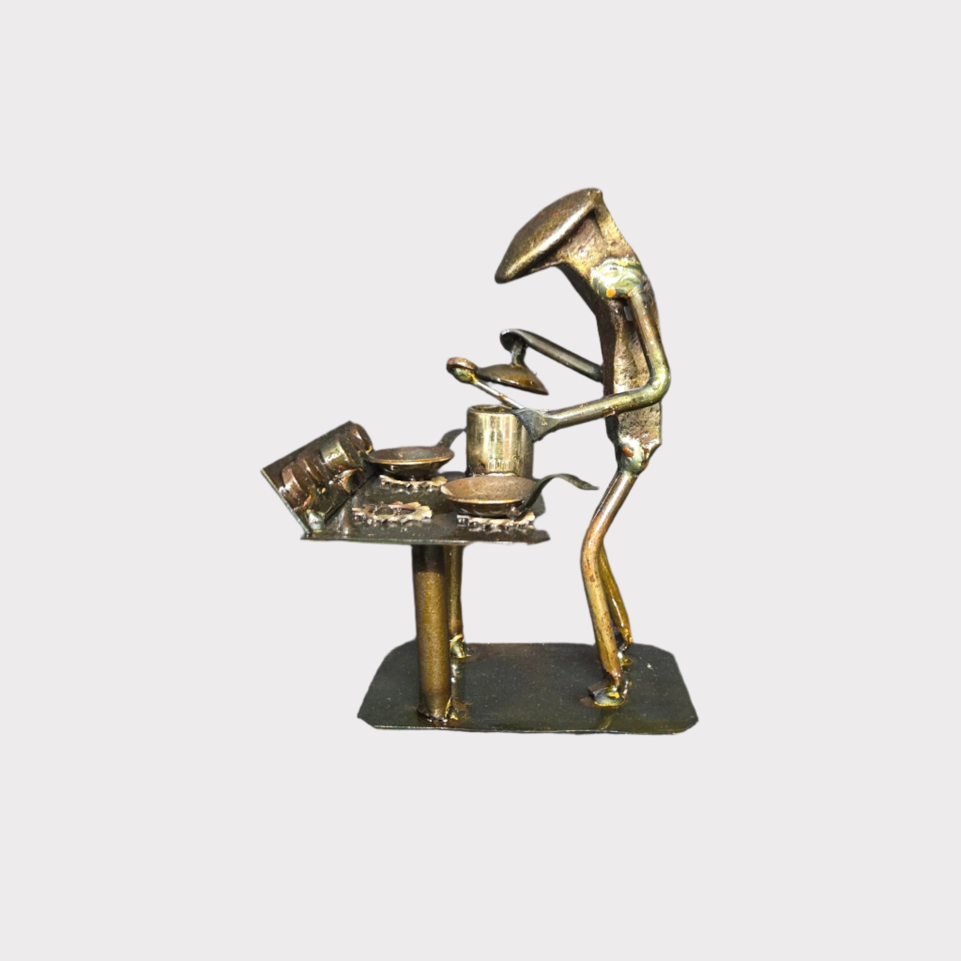 This figure is approximately 6 inches tall. It is common for cookware to vary.