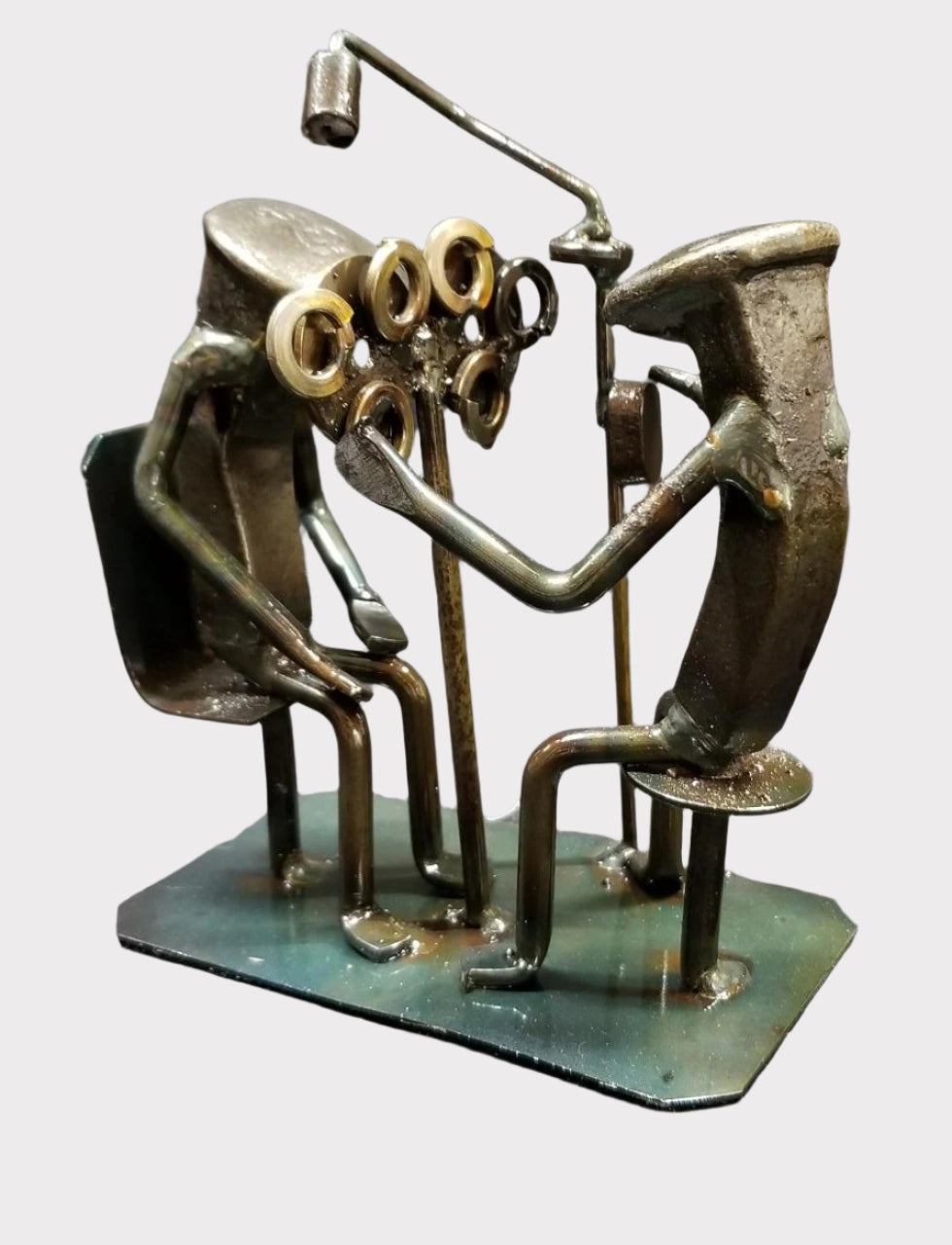 Eye Doctor with patient metal spike art product photo