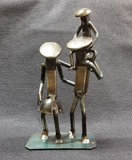 Family with kid on the shoulders metal spike art product photo