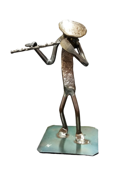 Musician holding flute up to mouth metal spike art product photo