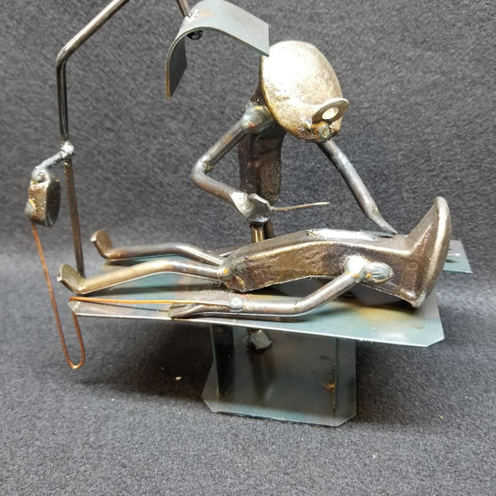 Heart Surgeon with patient on table metal spike art
