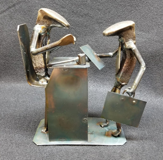 lawyer standing at judges desk with holding object metal spike art product photo