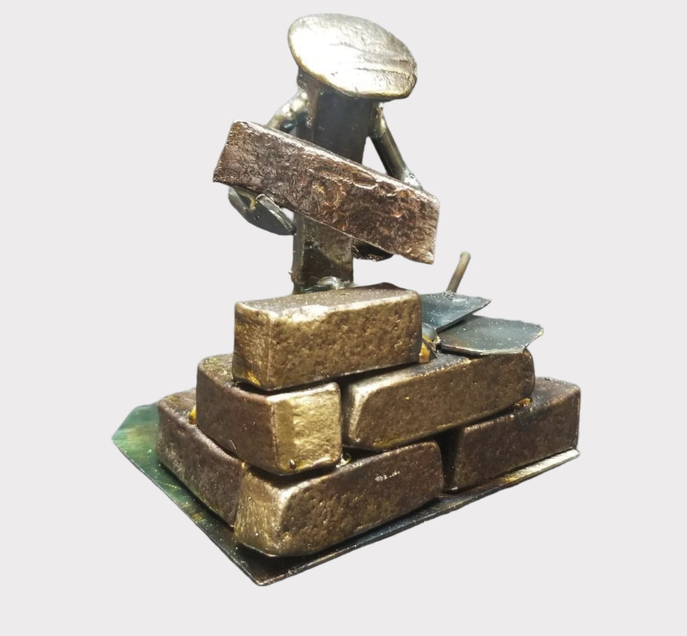 mason laying bricks with brick in hands metal spike art product photo