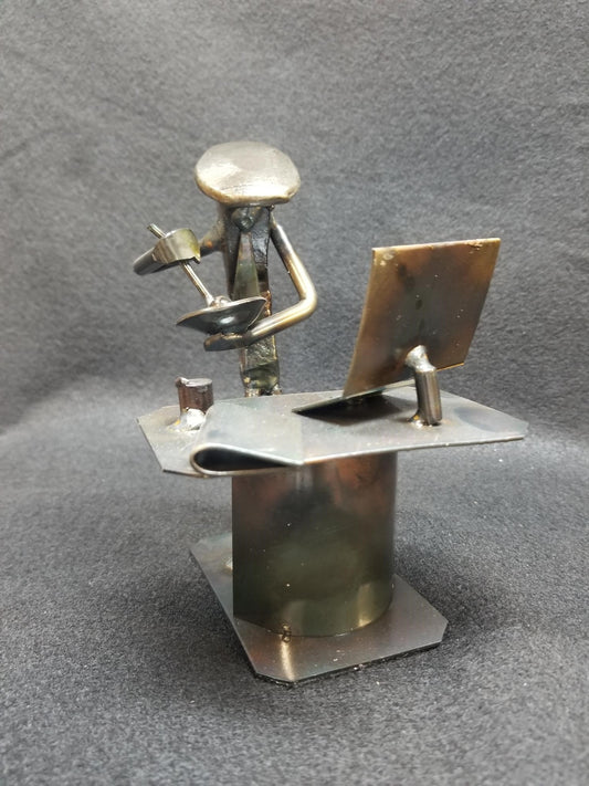 pharmacist in a tie mixing next to their table metal spike art product photo