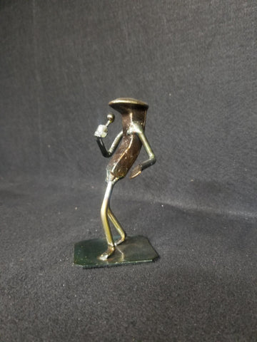 Singer holding wireless microphone metal spike art product photo