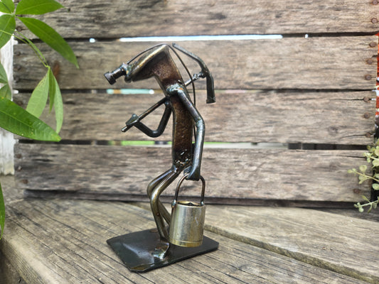 This figure stands approximately 6 to 7 inches tall.