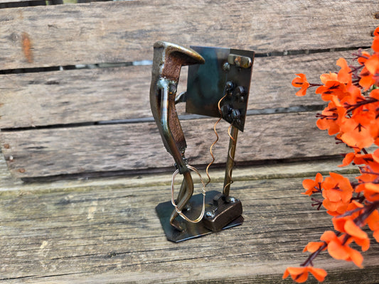 This figure stands approximately 6 to 7 inches tall.