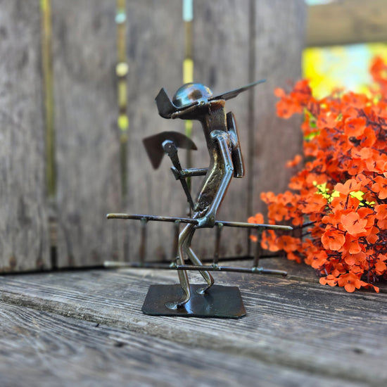 This figure is approximately 6-7 inches tall.
