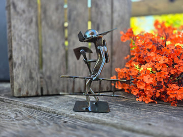 This figure is approximately 6-7 inches tall.