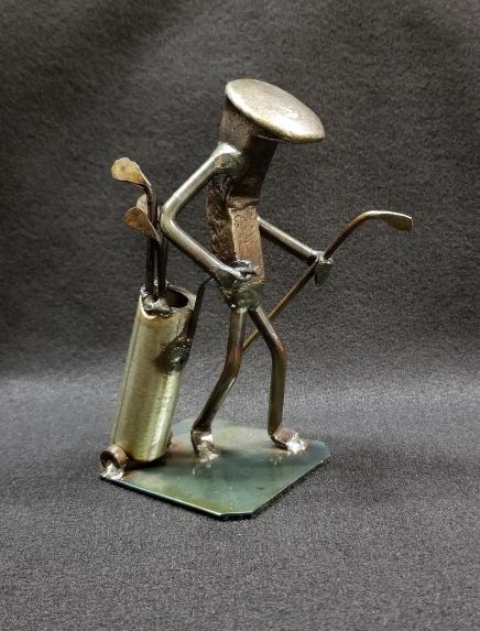 Golfer with their golf bag alternate angle metal spike art product photo