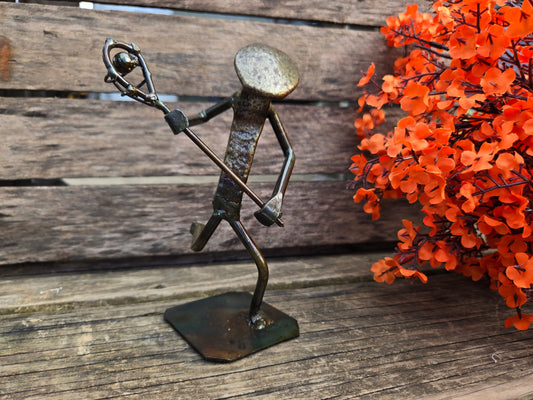 This figure stands approximately 6-7 inches tall.