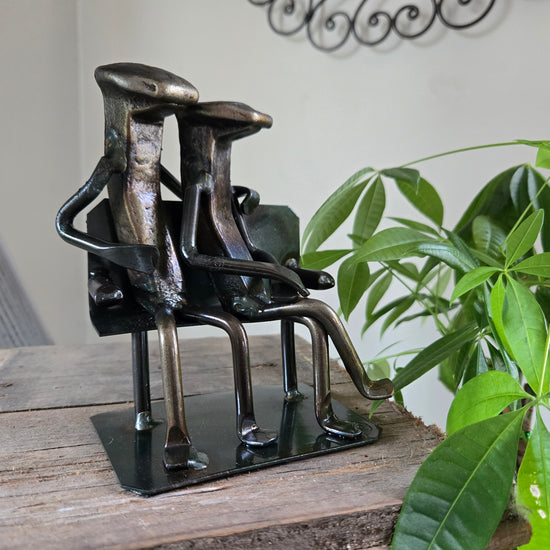 "Original" Couple on a Bench is approximately 5 inches tall.