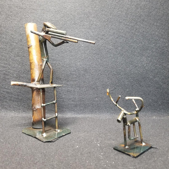 rifle hunter in tree stand metal spike art product photo
