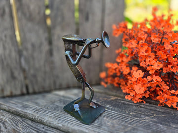 This figure is approximately 6-7 inches tall.