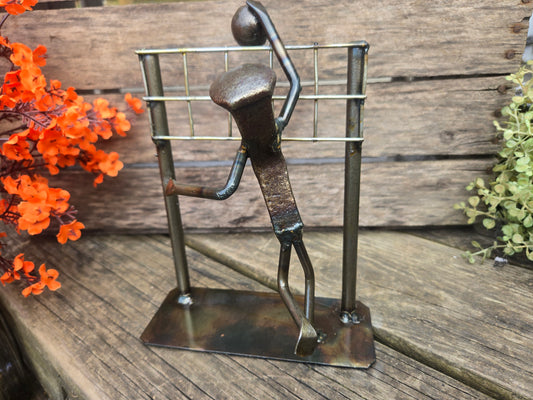 This figure stands approx. 7-8 inches tall.