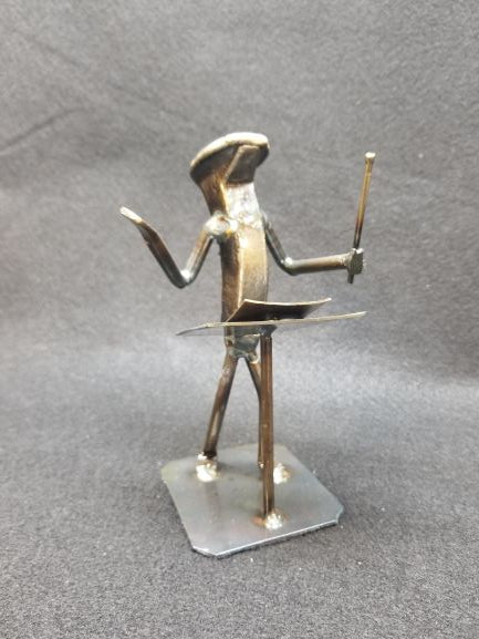 Conductor of an orchestra metal spike art product photo