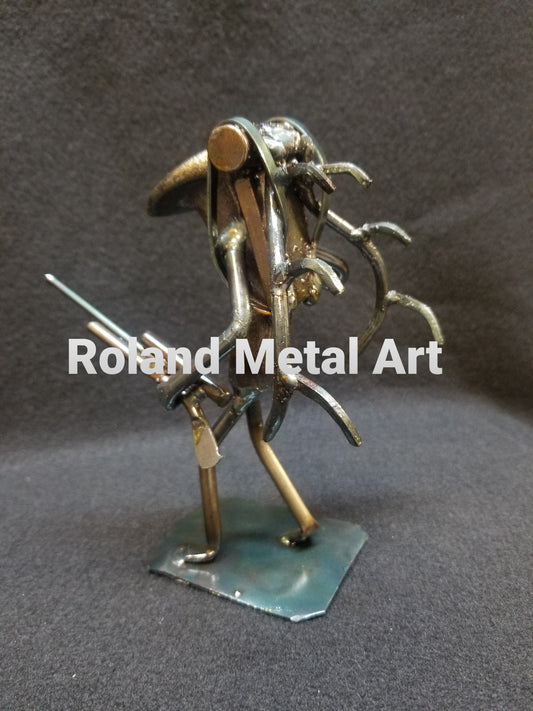 Elk Hunter holding rifle metal art