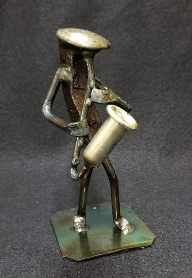 Musician playing the saxaphone metal spike art product photo