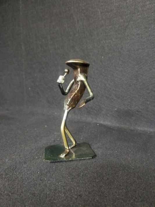 Singer holding wireless microphone metal spike art product photo