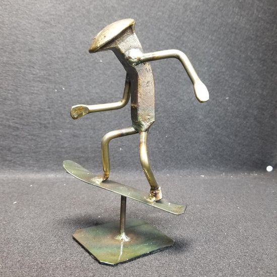 snowboard action pose metal spike art product photo