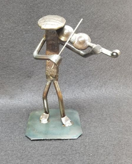 Musician playing the violin standing up metal spike art product photo